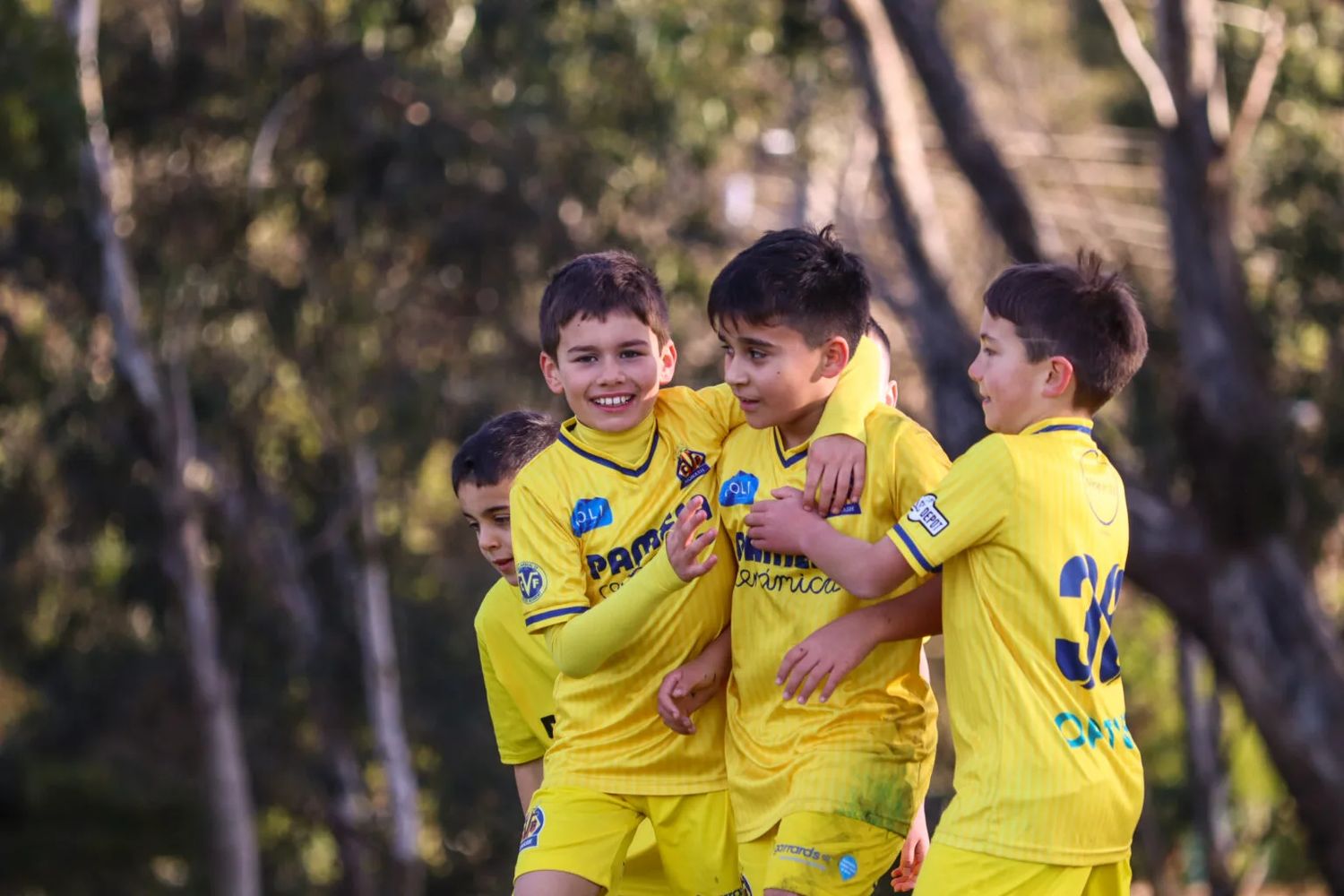 Monash Villarreal FC junior players celebrating together