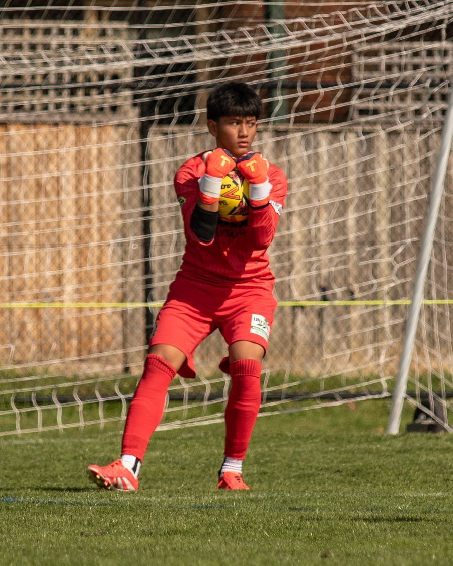 Monash Villarreal goalkeeper catching the ball in front of the goal